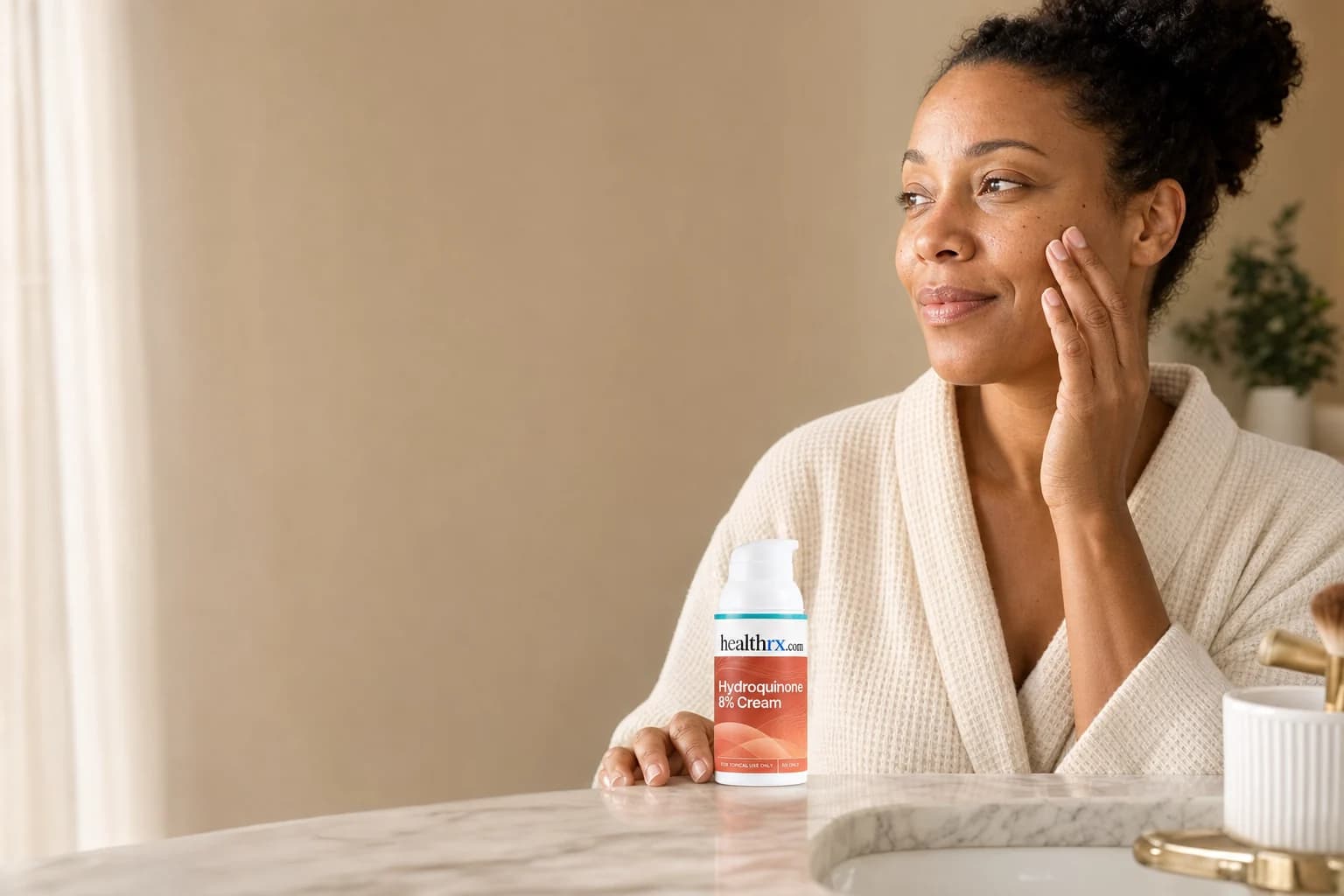 A woman in her early 40s during her morning skincare routine, with Hydroquinone 8% Cream