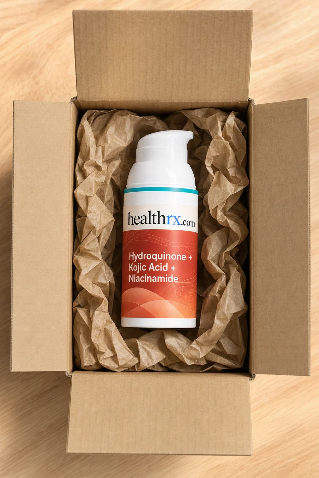 Hydroquinone / Kojic Acid / Niacinamide inside a plain, unmarked shipping box