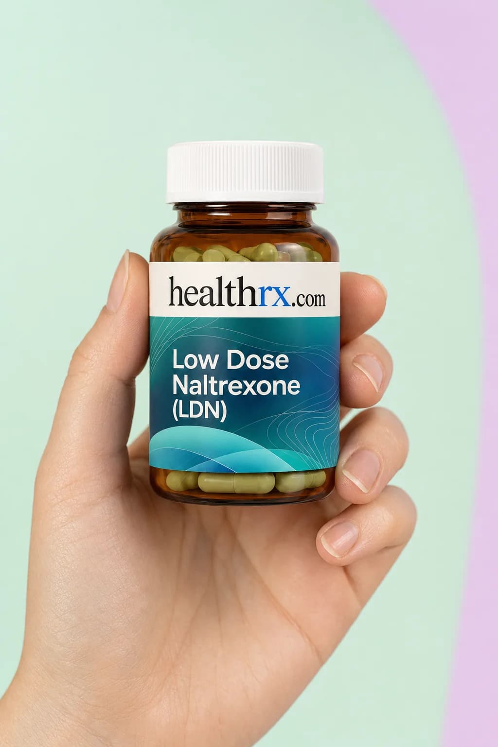 Low Dose Naltrexone (LDN) held in one hand, showing its size