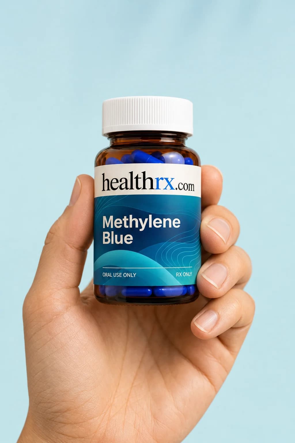 Methylene Blue held in one hand, showing its size