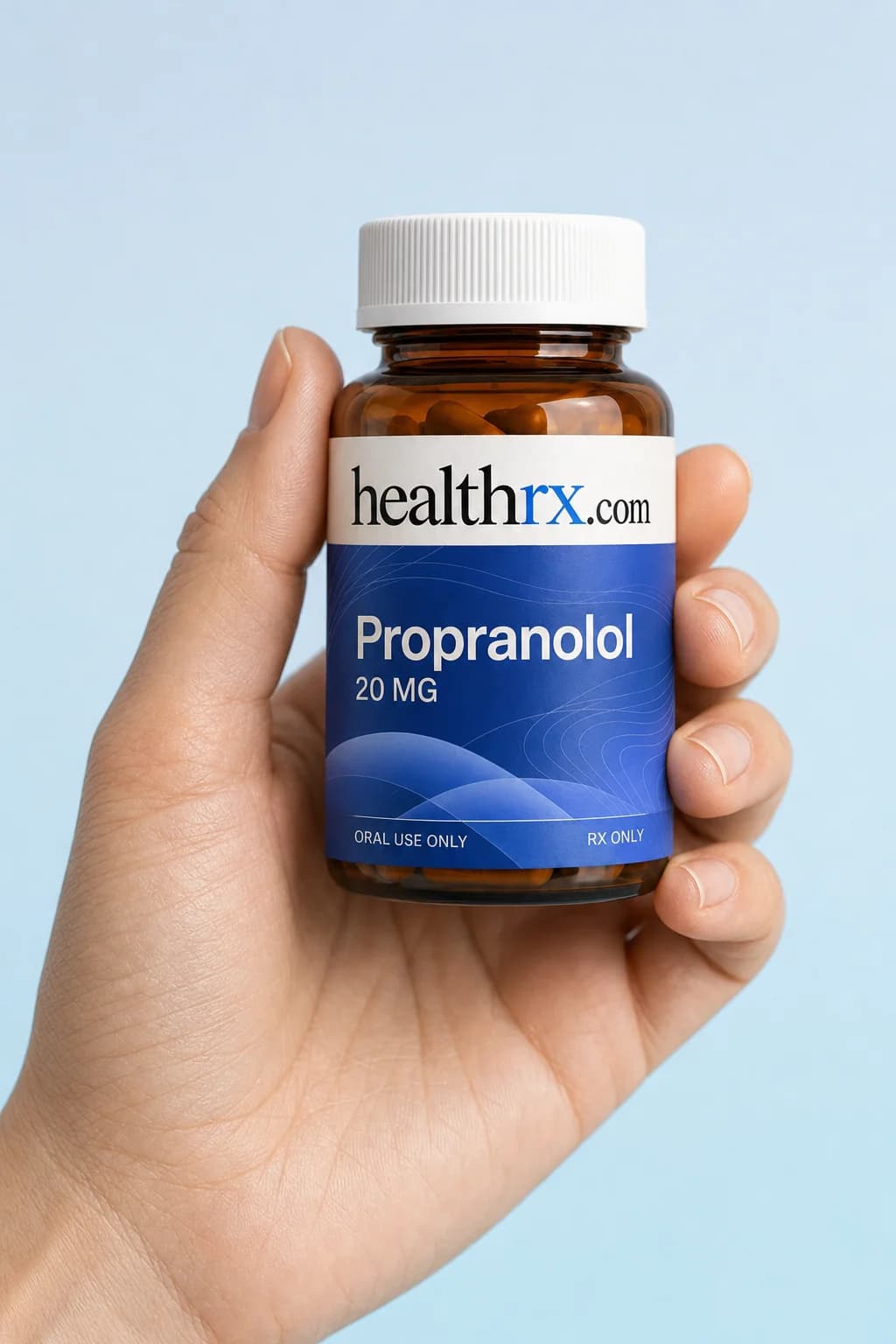 Propranolol held in one hand, showing its size