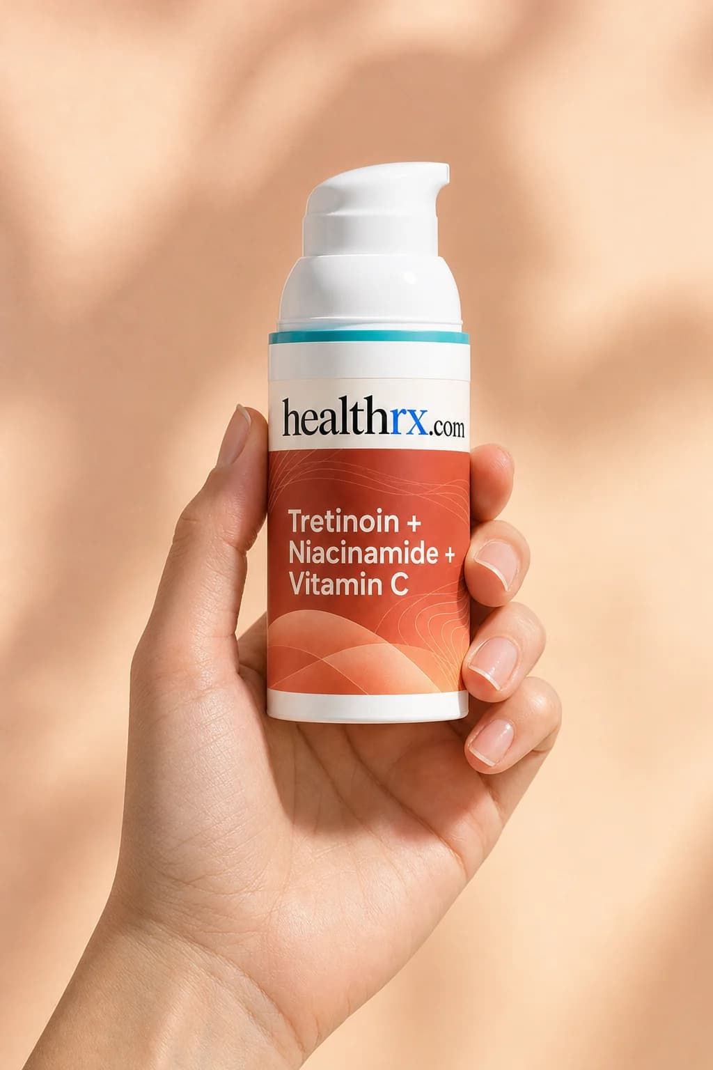 Tretinoin / Niacinamide / Vitamin C held in one hand, showing its size