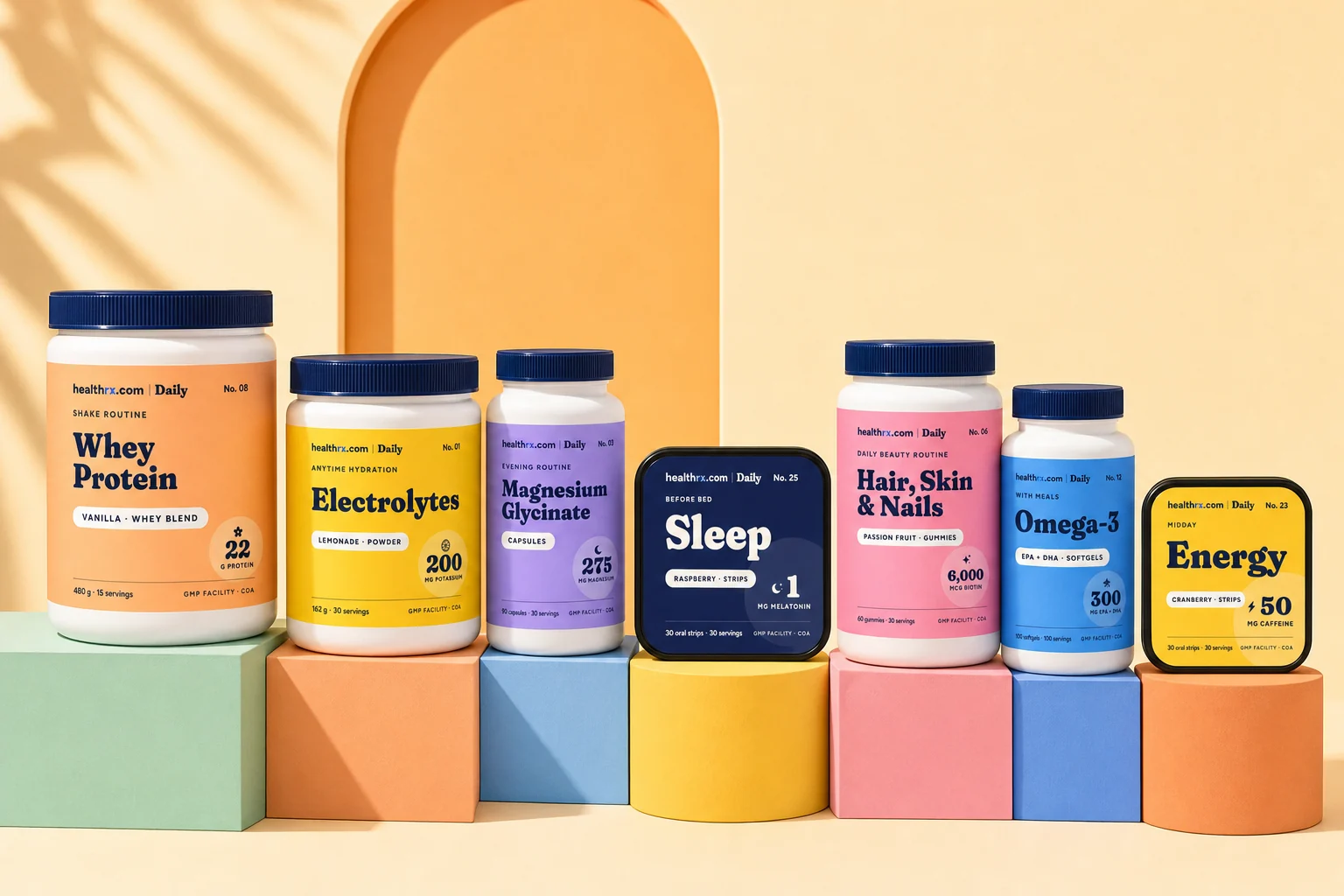 The HealthRX.com Daily supplement range on colored pedestals: protein tubs, capsule bottles, gummy jars and pocket tins