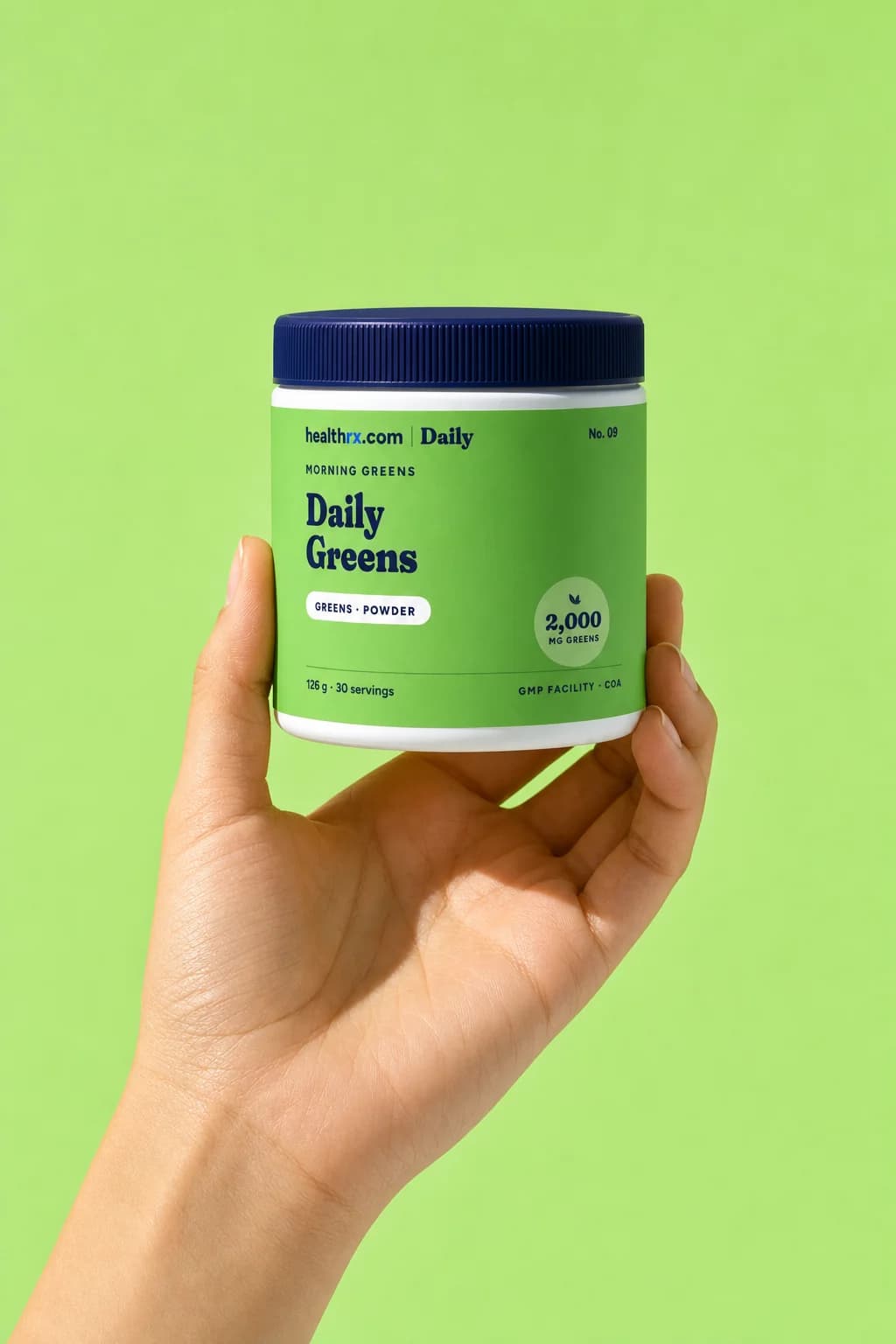Daily Greens in a hand, showing its size