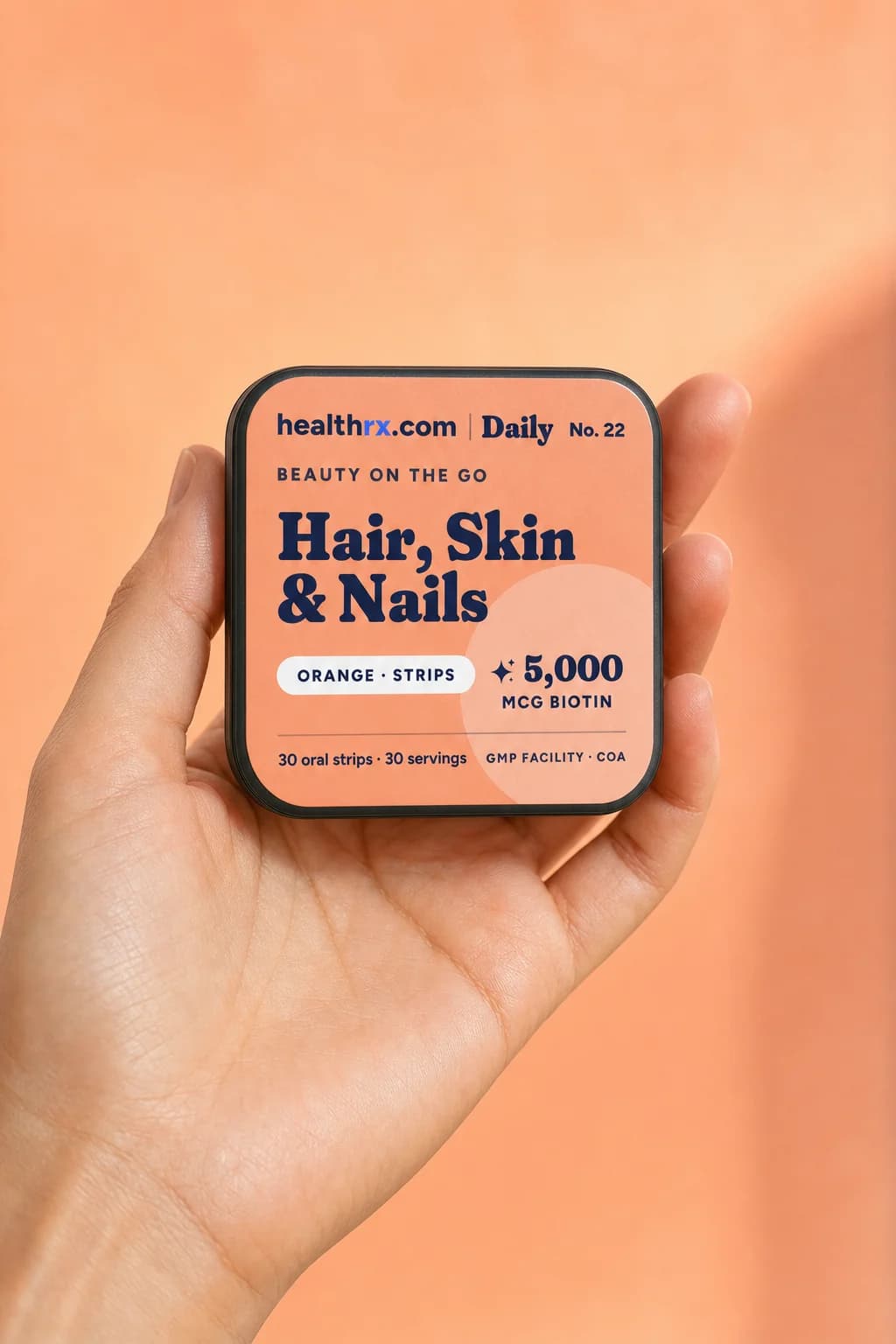 Hair, Skin & Nails Strips in a hand, showing its size