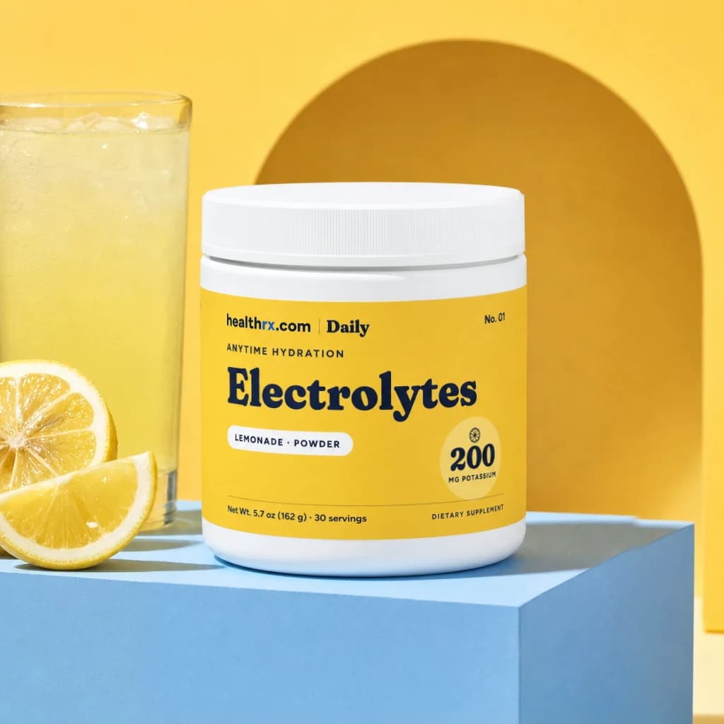 Lemonade Electrolytes by HealthRX.com in its lemonade powder packaging concept, on a colored pedestal